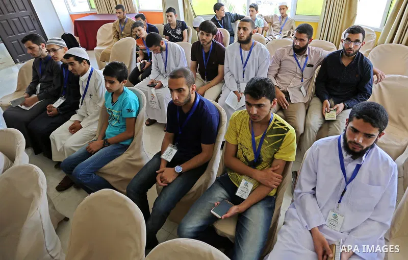 Palestinians attend the ceremony of Conservation of the holy Koran competition "Jerusalem Prize", in Gaza city on June 15, 2017. Photo by Ashraf Amra