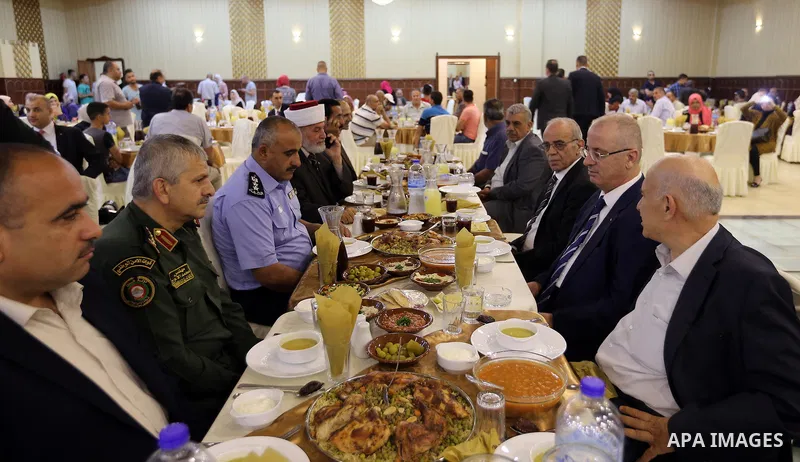 Palestinian Prime Minister, Rami Hamdallah, attends the breakfast for the martyrs families, in the West Bank city of Ramallah, on June 15, 2017. Photo by Prime Minister Office