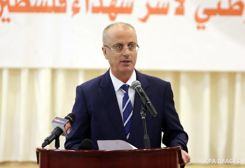 Palestinian Prime Minister, Rami Hamdallah, attends the breakfast for the martyrs families, in the West Bank city of Ramallah, on June 15, 2017. Photo by Prime Minister Office