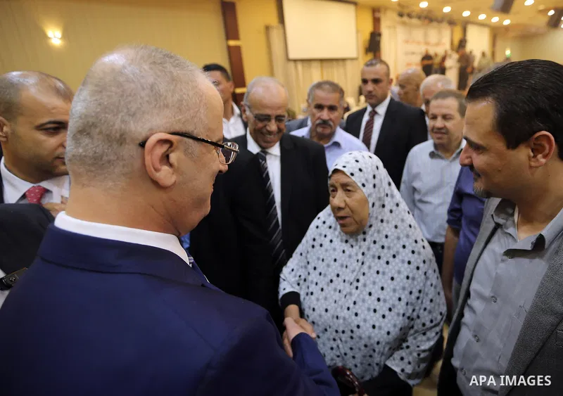 Palestinian Prime Minister, Rami Hamdallah, attends the breakfast for the martyrs families, in the West Bank city of Ramallah, on June 15, 2017. Photo by Prime Minister Office
