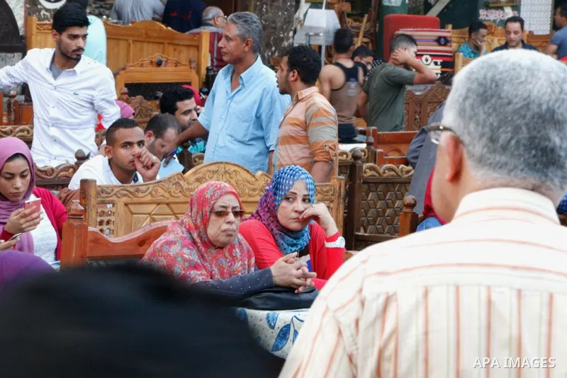 Egyptian muslims take their breakfast during the holy fasting month of Ramadan in front of al-Hussein mosque at Al-Azhar district in old Islamic Cairo, Egypt, on June 17, 2017. Ramadan is sacred to Muslims because it is...