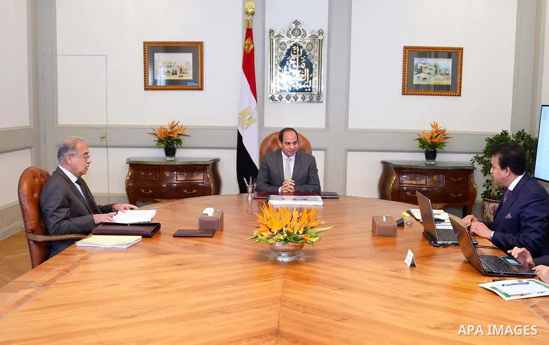 Egyptian President Abdel Fattah al-Sisi meets with Prime Minister Sharif Ismail and Minister of Higher Education Khalid Abdul Ghaffar, in Cairo, Egypt, on June 17, 2017. Photo by Egyptian President Office