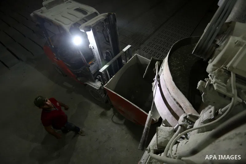 A Palestinian labourer works at a cement factory at night, to avoid the day time heat, on the Muslim holy fasting month of Ramadan in Gaza city on June 17, 2017. Ramadan is sacred to Muslims because it is during that mon...