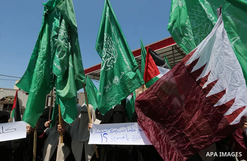 Palestinian women take part in a rally in support of Qatar and against the blockade on the Gaza Strip, in front of the Legislative Council in Gaza city on June 18, 2017. Photo by Ashraf Amra