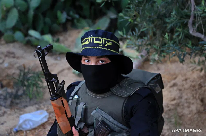 A member of Palestinian militant form the Al-Quds Brigades, the armed wing of the Islamic Jihad movement guards the border between the Gaza Strip and Israel on the Muslim holy fasting month of Ramadan on June 17, 2017. R...