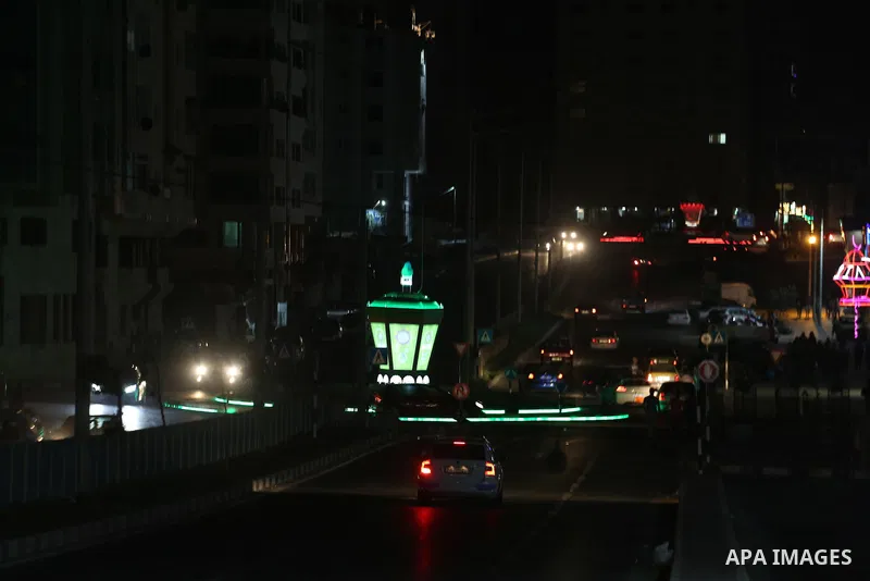 A general view shows Gaza City in the evening hours during a power cut, on June 19, 2017. Photo by Mohammed Asad