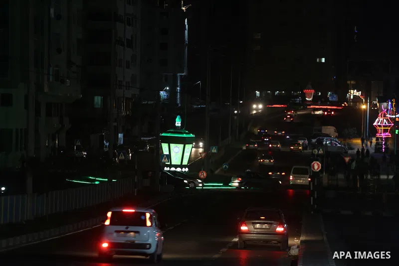 A general view shows Gaza City in the evening hours during a power cut, on June 19, 2017. Photo by Mohammed Asad