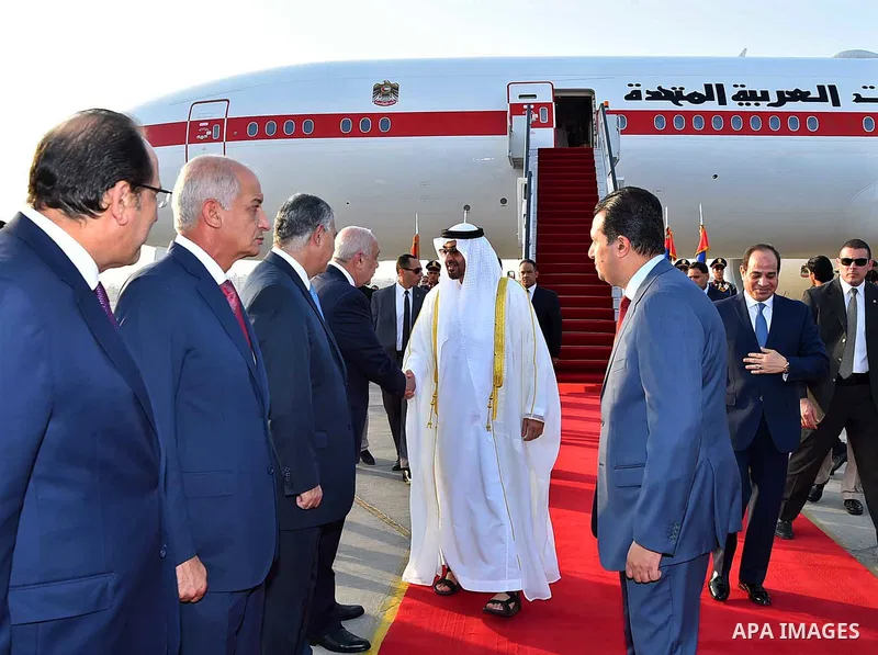 Egyptian President Abdel Fattah al-Sis welcomes to Abu Dhabi Crown Prince Sheikh Mohammed bin Zayed al-Nahyan after he arrives in Cairo International Airport on June 19, 2017. Photo by Egyptian President Office