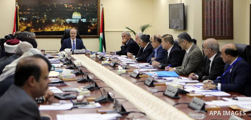 Palestinian Prime Minister Rami Hamdallah chairs a meeting of council of Ministers in the West Bank city of Ramallah, on June 20, 2017. Photo by Prime Minister Office