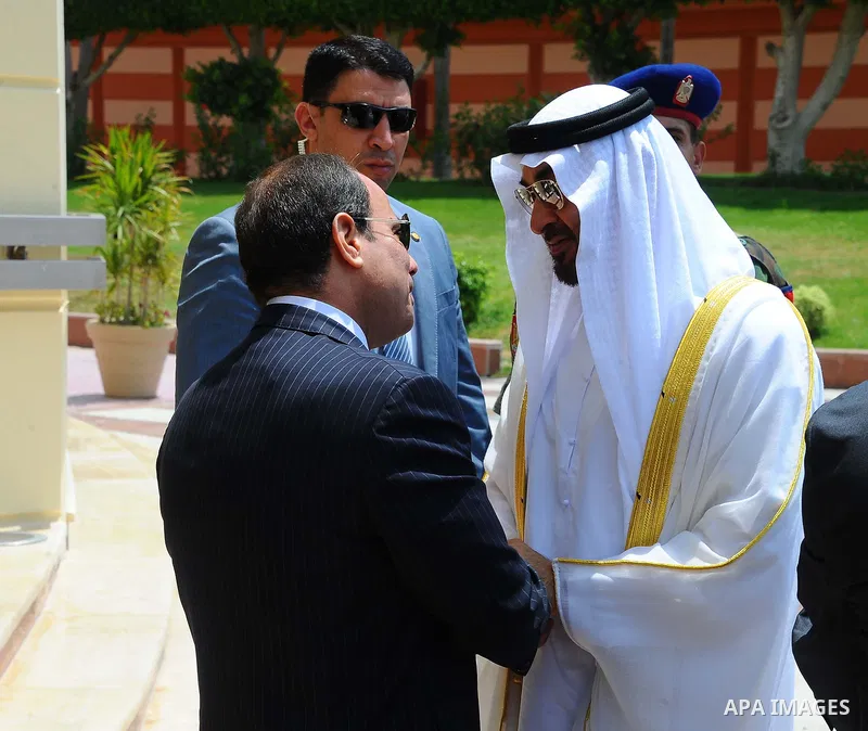 Egyptian President Abdel Fattah Sisi bids farewell to bu Dhabi Crown Prince Sheikh Mohammed bin Zayed al-Nahyan at Cairo International Airport in Cairo on June 20, 2017. Photo by Egyptian President Office