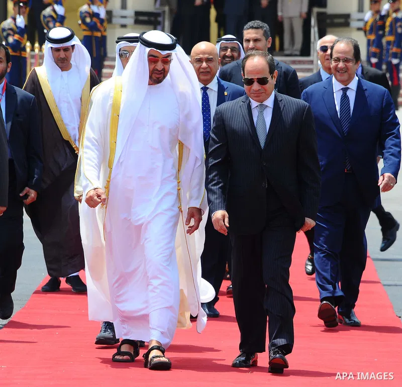 Egyptian President Abdel Fattah Sisi bids farewell to bu Dhabi Crown Prince Sheikh Mohammed bin Zayed al-Nahyan at Cairo International Airport in Cairo on June 20, 2017. Photo by Egyptian President Office