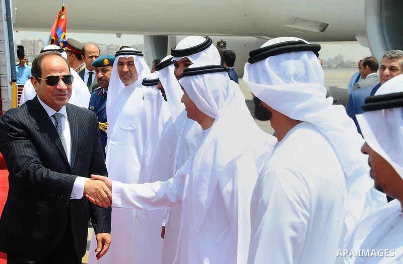 Egyptian President Abdel Fattah Sisi bids farewell to bu Dhabi Crown Prince Sheikh Mohammed bin Zayed al-Nahyan at Cairo International Airport in Cairo on June 20, 2017. Photo by Egyptian President Office