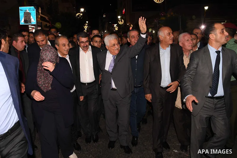 Palestinian President Mahmoud Abbas roams at the streets on the West Bank city of Ramallah on June 20, 2017. Photo by Thaer Ganaim