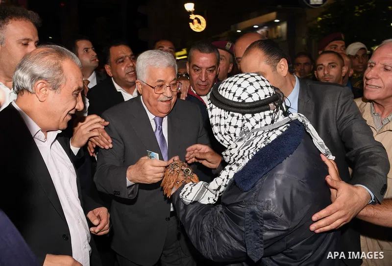 Palestinian President Mahmoud Abbas roams at the streets on the West Bank city of Ramallah on June 20, 2017. Photo by Thaer Ganaim