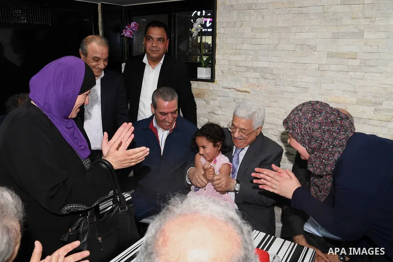 Palestinian President Mahmoud Abbas roams at the streets on the West Bank city of Ramallah on June 20, 2017. Photo by Thaer Ganaim