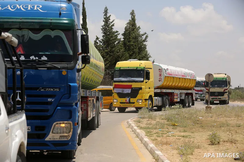 Egyptian trucks carrying fuel arrive to Gaza's power plant in Nusseirat, in the central Gaza Strip after entering the southern Gaza Strip from Egypt through the Rafah border crossing on June 21, 2017. Egypt began to deli...