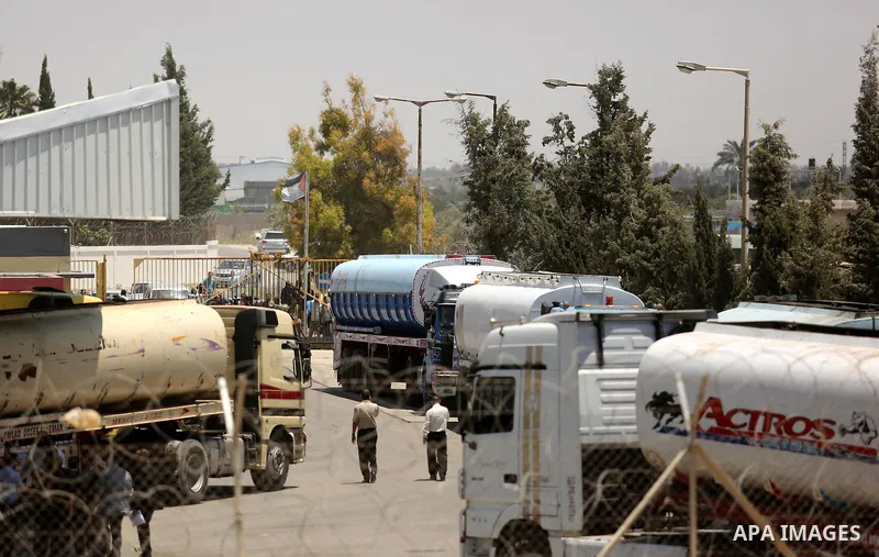 Egyptian trucks carrying fuel arrive to Gaza's power plant in Nusseirat, in the central Gaza Strip after entering the southern Gaza Strip from Egypt through the Rafah border crossing on June 21, 2017. Egypt began to deli...