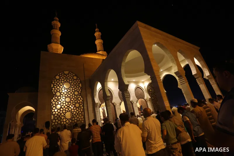 Palestinian Muslim worshippers pray overnight on July 22, 2017 at a Mosque in Gaza city on the occasion of Laylat al-Qadr which falls on the 27th day of the fasting month of Ramadan. Laylat al-Qadr, or Night of Destiny,...