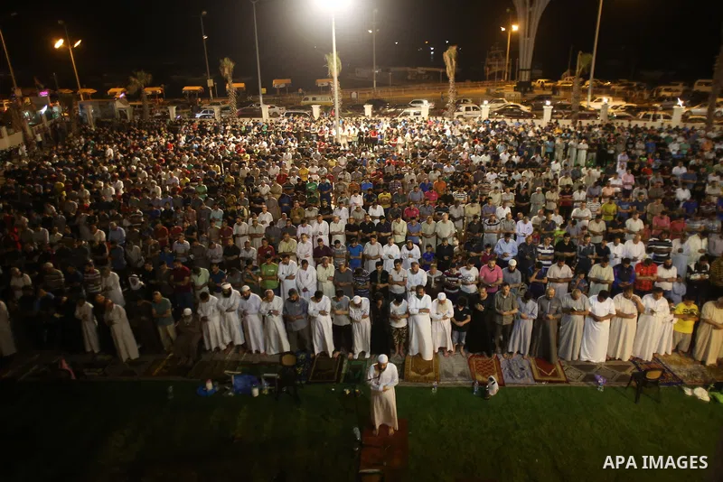 Palestinian Muslim worshippers pray overnight on July 22, 2017 at a Mosque in Gaza city on the occasion of Laylat al-Qadr which falls on the 27th day of the fasting month of Ramadan. Laylat al-Qadr, or Night of Destiny,...