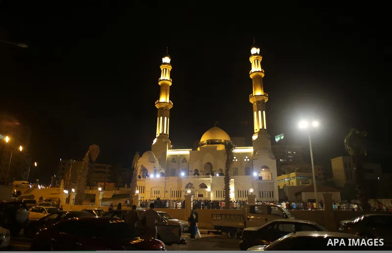 Palestinian Muslim worshippers pray overnight on July 22, 2017 at a Mosque in Gaza city on the occasion of Laylat al-Qadr which falls on the 27th day of the fasting month of Ramadan. Laylat al-Qadr, or Night of Destiny,...
