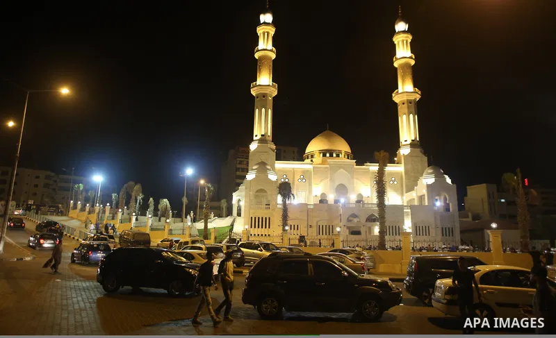 Palestinian Muslim worshippers pray overnight on July 22, 2017 at a Mosque in Gaza city on the occasion of Laylat al-Qadr which falls on the 27th day of the fasting month of Ramadan. Laylat al-Qadr, or Night of Destiny,...