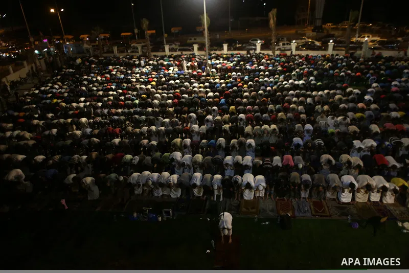 Palestinian Muslim worshippers pray overnight on July 22, 2017 at a Mosque in Gaza city on the occasion of Laylat al-Qadr which falls on the 27th day of the fasting month of Ramadan. Laylat al-Qadr, or Night of Destiny,...