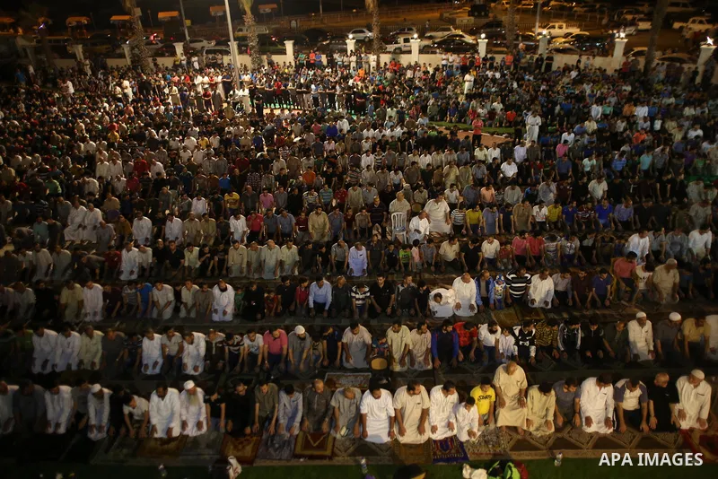 Palestinian Muslim worshippers pray overnight on July 22, 2017 at a Mosque in Gaza city on the occasion of Laylat al-Qadr which falls on the 27th day of the fasting month of Ramadan. Laylat al-Qadr, or Night of Destiny,...