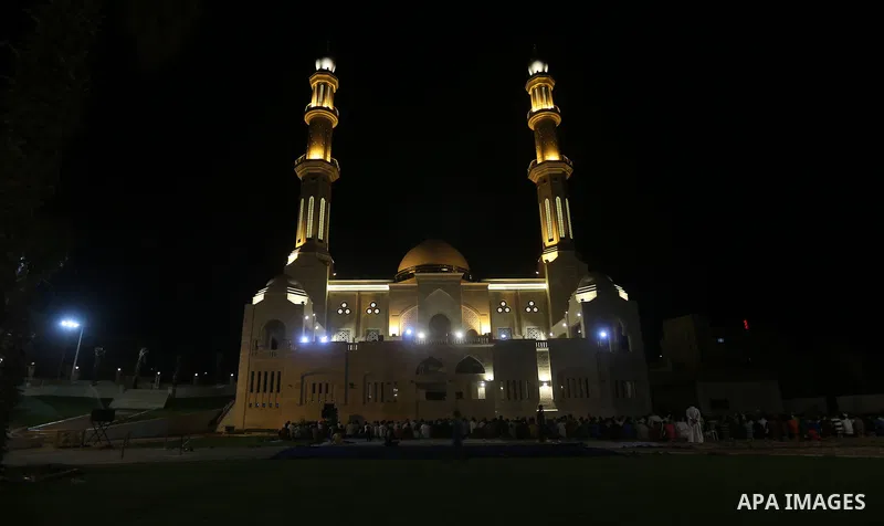 Palestinian Muslim worshippers pray overnight on July 22, 2017 at a Mosque in Gaza city on the occasion of Laylat al-Qadr which falls on the 27th day of the fasting month of Ramadan. Laylat al-Qadr, or Night of Destiny,...