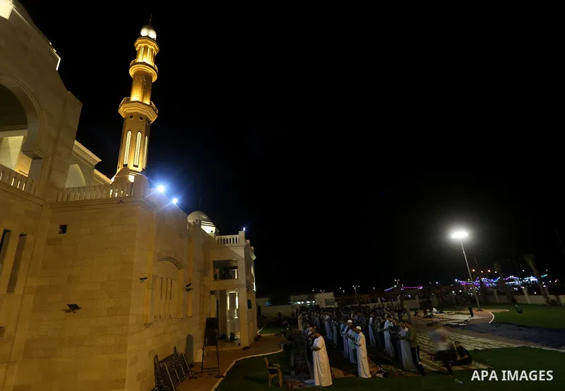 Palestinian Muslim worshippers pray overnight on July 22, 2017 at a Mosque in Gaza city on the occasion of Laylat al-Qadr which falls on the 27th day of the fasting month of Ramadan. Laylat al-Qadr, or Night of Destiny,...