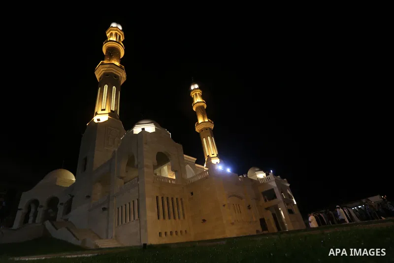 Palestinian Muslim worshippers pray overnight on July 22, 2017 at a Mosque in Gaza city on the occasion of Laylat al-Qadr which falls on the 27th day of the fasting month of Ramadan. Laylat al-Qadr, or Night of Destiny,...