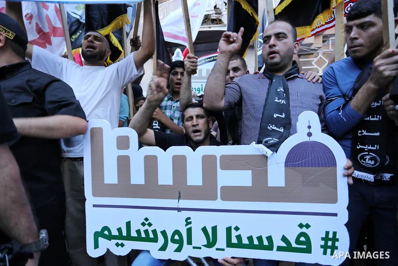 Palestinians take part in a protest marking the annual al-Quds Day, or Jerusalem Day, following Friday prayer in Gaza city June 23, 2017. Photo by Ashraf Amra