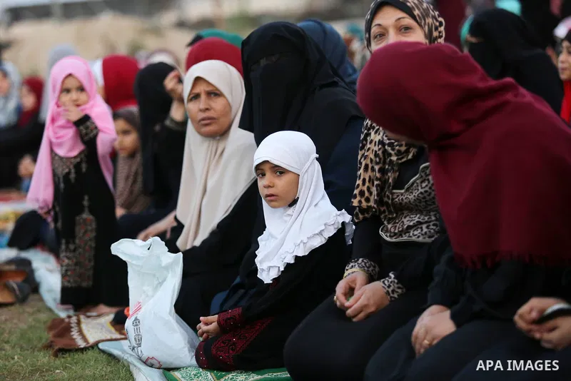 Palestinian Muslim women perform Eid al-Fitr prayers in Gaza City June 25, 2017. Eid al-Fitr marks the end of Muslim's holy fasting month of Ramadan when faithfuls abstain from eating, drinking, smoking and sexual activi...