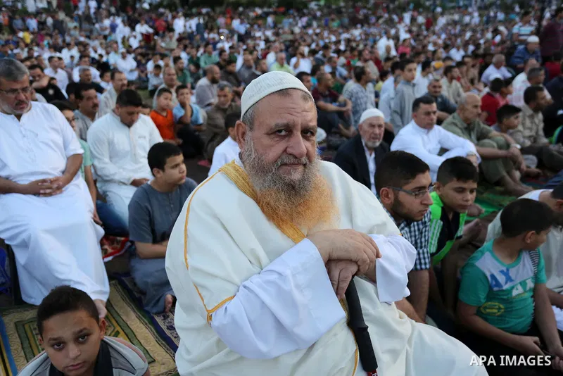 Palestinian Muslims perform Eid al-Fitr prayers in Gaza City June 25, 2017. Eid al-Fitr marks the end of Muslim's holy fasting month of Ramadan when faithfuls abstain from eating, drinking, smoking and sexual activities...