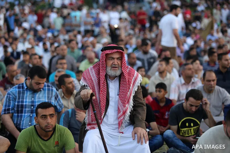 Palestinian Muslims perform Eid al-Fitr prayers in Gaza City June 25, 2017. Eid al-Fitr marks the end of Muslim's holy fasting month of Ramadan when faithfuls abstain from eating, drinking, smoking and sexual activities...