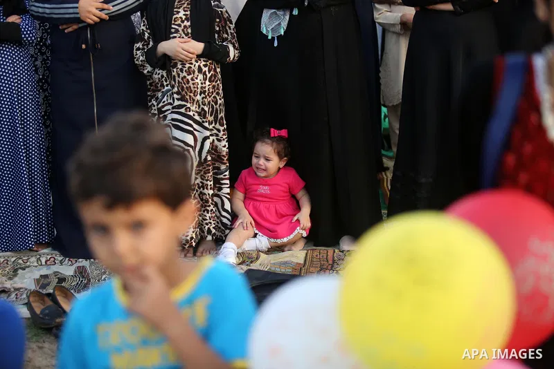 Palestinian Muslim women perform Eid al-Fitr prayers in Gaza City June 25, 2017. Eid al-Fitr marks the end of Muslim's holy fasting month of Ramadan when faithfuls abstain from eating, drinking, smoking and sexual activi...