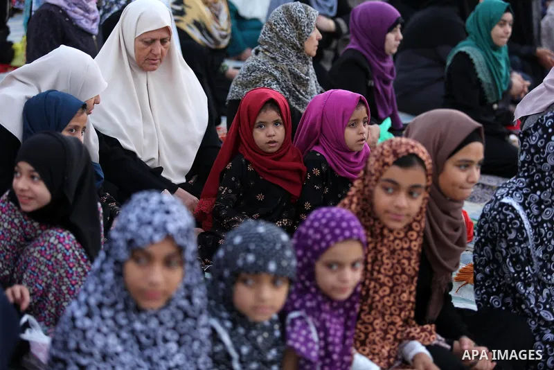 Palestinian Muslim women perform Eid al-Fitr prayers in Gaza City June 25, 2017. Eid al-Fitr marks the end of Muslim's holy fasting month of Ramadan when faithfuls abstain from eating, drinking, smoking and sexual activi...