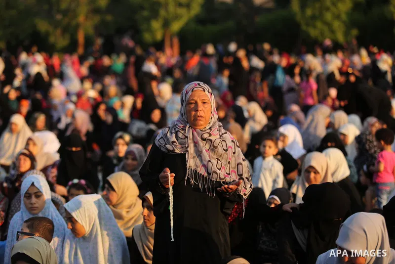 Palestinian Muslim women perform Eid al-Fitr prayers in Gaza City June 25, 2017. Eid al-Fitr marks the end of Muslim's holy fasting month of Ramadan when faithfuls abstain from eating, drinking, smoking and sexual activi...