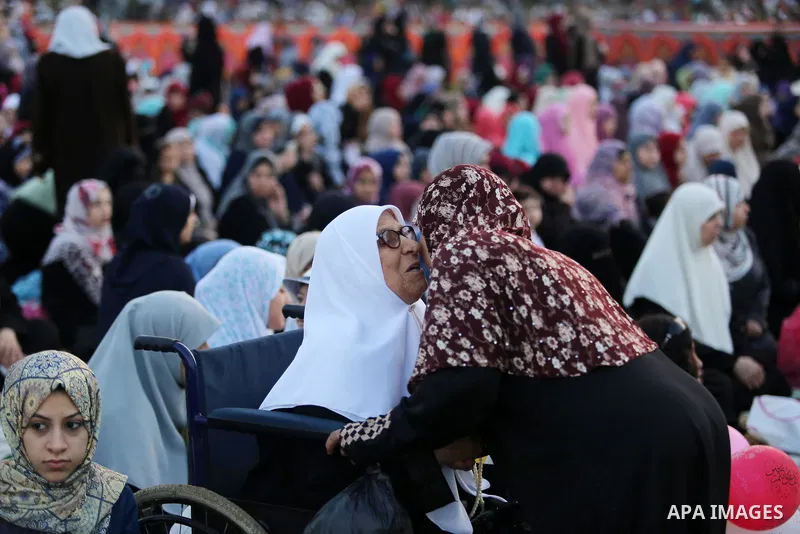 Palestinian Muslim women perform Eid al-Fitr prayers in Gaza City June 25, 2017. Eid al-Fitr marks the end of Muslim's holy fasting month of Ramadan when faithfuls abstain from eating, drinking, smoking and sexual activi...