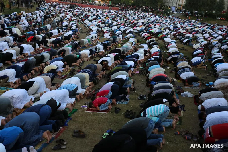Palestinian Muslims perform Eid al-Fitr prayers in Gaza City June 25, 2017. Eid al-Fitr marks the end of Muslim's holy fasting month of Ramadan when faithfuls abstain from eating, drinking, smoking and sexual activities...