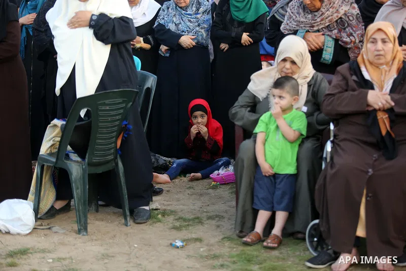 Palestinian Muslim women perform Eid al-Fitr prayers in Gaza City June 25, 2017. Eid al-Fitr marks the end of Muslim's holy fasting month of Ramadan when faithfuls abstain from eating, drinking, smoking and sexual activi...