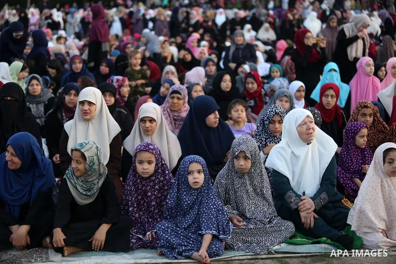 Palestinian Muslim women perform Eid al-Fitr prayers in Gaza City June 25, 2017. Eid al-Fitr marks the end of Muslim's holy fasting month of Ramadan when faithfuls abstain from eating, drinking, smoking and sexual activi...
