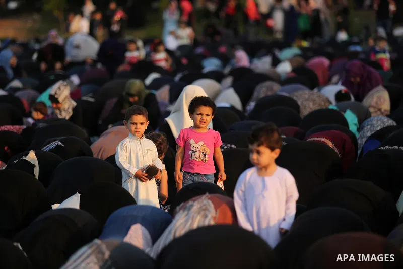 Palestinian Muslim women perform Eid al-Fitr prayers in Gaza City June 25, 2017. Eid al-Fitr marks the end of Muslim's holy fasting month of Ramadan when faithfuls abstain from eating, drinking, smoking and sexual activi...