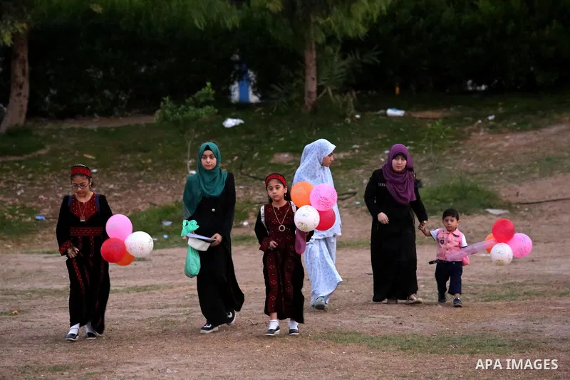 Palestinian Muslim women perform Eid al-Fitr prayers in Gaza City June 25, 2017. Eid al-Fitr marks the end of Muslim's holy fasting month of Ramadan when faithfuls abstain from eating, drinking, smoking and sexual activi...