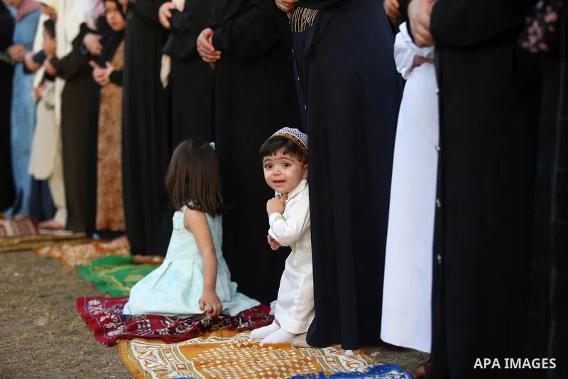 Palestinian Muslim women perform Eid al-Fitr prayers in Gaza City June 25, 2017. Eid al-Fitr marks the end of Muslim's holy fasting month of Ramadan when faithfuls abstain from eating, drinking, smoking and sexual activi...