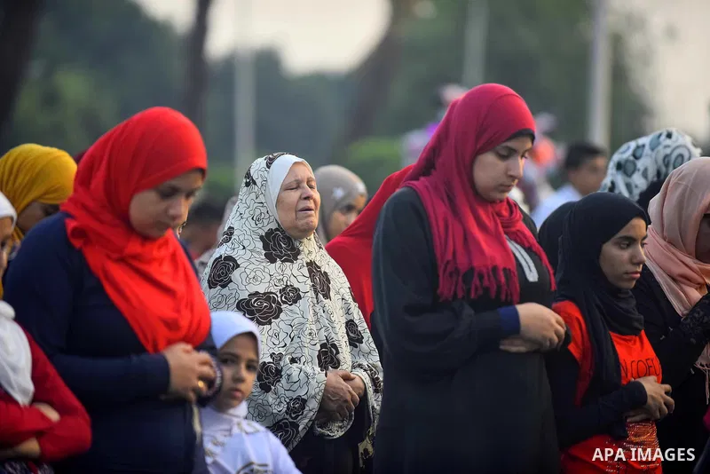 Egyptians attend the morning prayers for Eid al-Fitr celebrations, which marks the end of the holy fasting month of Ramadan, in Cairo, Egypt, on June 25, 2017. Photo by Amr Sayed