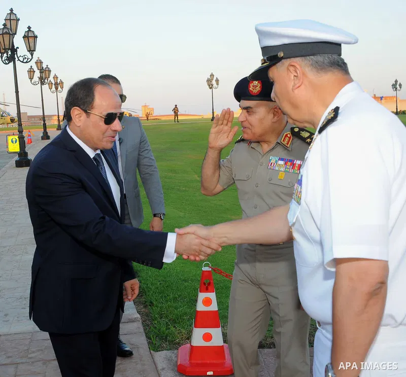 Egyptian President Abdel Fattah al-Sisi performs the morning prayer of Eid al-Fitr holiday which marks the end of the Muslim holy month of Ramadan, in Cairo, Egypt, on June 25, 2017. Photo by Egyptian President Office