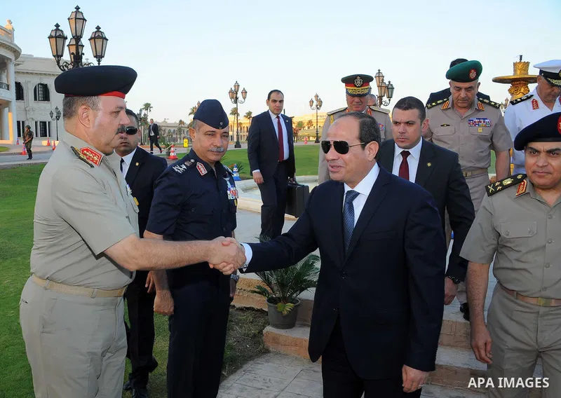Egyptian President Abdel Fattah al-Sisi performs the morning prayer of Eid al-Fitr holiday which marks the end of the Muslim holy month of Ramadan, in Cairo, Egypt, on June 25, 2017. Photo by Egyptian President Office
