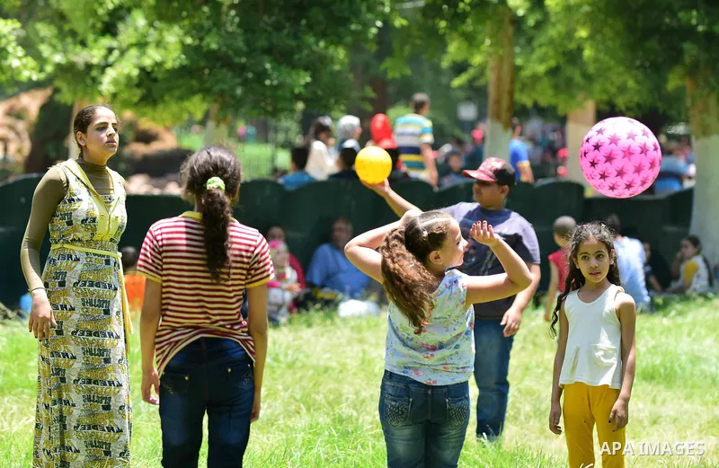 Egyptians enjoy at a zoo on the second day of of Eid al-Fitr holiday which marks the end of the Muslim holy month of Ramadan, in Cairo June 26, 2017. Photo by Amr Sayed