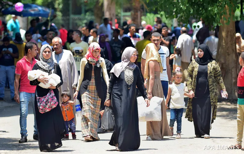Egyptians enjoy at a zoo on the second day of of Eid al-Fitr holiday which marks the end of the Muslim holy month of Ramadan, in Cairo June 26, 2017. Photo by Amr Sayed