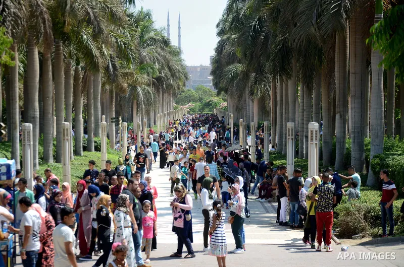 Egyptians celebrate on the second day of Eid al-Fitr holiday which marks the end of the Muslim holy month of Ramadan, in Cairo June 26, 2017. Photo by Amr Sayed
